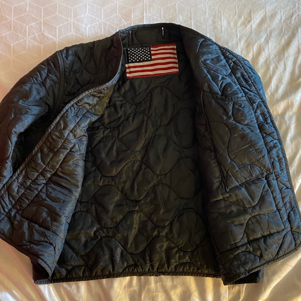 Vintage upscaled oversized Army quilted liner.